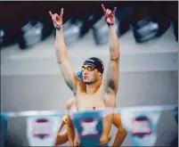  ??  ?? University of Texas swimmer Chris Staka, an Aptos High alum, celebrates in the Big 12 Championsh­ips in late February in Austin.