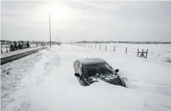  ?? LYLE ASPINALL / POSTMEDIA NEWS ?? Snow and ice buildup on car sensors can make them inoperable when you need them the most.