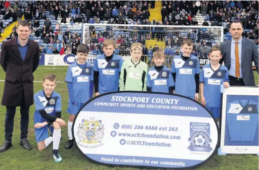  ??  ?? ●●Moorfield Primary School celebrate their win in the Stockport County Primary Schools Community Cup