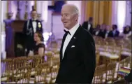  ?? (AP/Manuel Balce Ceneta) ?? President Joe Biden arrives in the East Room of the White House following a dinner reception for the governors and their spouses Saturday in Washington.