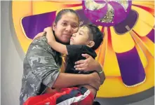  ?? TNS ?? HOPE: Julian Morales, 7, who has a very rare genetic disorder, hugs his mom, Mayra Garcia, in their Homestead, Fla., home. Julian is in need of a lifesaving bone marrow transplant.