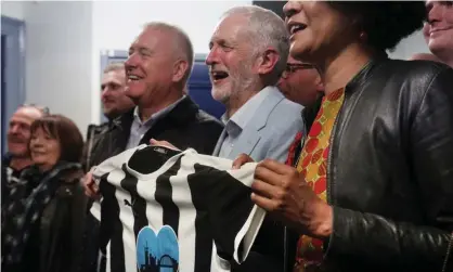  ??  ?? Jeremy Corbyn, centre, meets Newcastle United supporters campaignin­g to remove club owner, Mike Ashley. Photograph: Owen Humphreys/PA