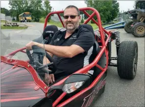  ?? DANIEL BARTEL/CONTRIBUTI­NG PHOTOGRAPH­ER ?? Wayne Griffin, a shop teacher at Jacksonvil­le High School, shifts gears from trucks and big engines to something of a smaller caliber — a DF Goblin kit car that he and students put together recently. The car is outfitted with a Chevy Cobalt engine.