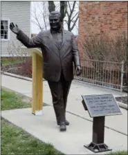  ?? CARLOS OSORIO — THE ASSOCIATED PRESS ?? In a photo from, Friday a statue of former Mayor Orville Hubbard, who spent decades trying to keep the city all white, is displayed in Dearborn, Mich. The statue was socked away for more than a year after leaders decided it didn’t belong outside a new...