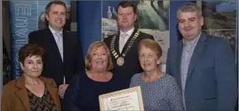  ??  ?? Clare Carroll and Nuala O’Leary from Blackwater Tidy Towns receiving the National Tidy Towns National Award with Sheila Lacey (Wexford County Council), Deputy James Browne TD, Cathaoirle­ach of Gorey Kilmuckrid­ge Municipal District Cllr Malcolm Byrne and Cllr Oliver Walsh.