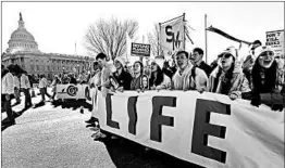  ?? SUSAN WALSH/AP ?? Marchers for Life on Capitol Hill got a verbal boost Friday from President Donald Trump.