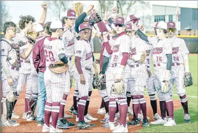  ?? Photo courtesy of Krystal Elmore ?? The Siloam Springs baseball team prepares to take the field against Gravette on March 15.