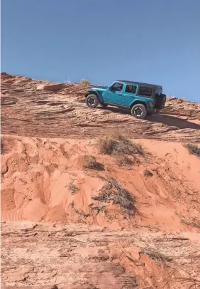  ??  ?? 2020 Jeep Wrangler Ecodiesel tackles rocky terrain in Utah.