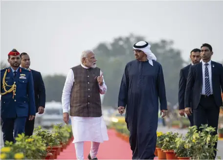  ?? Hamad Al Kaabi / UAE Presidenti­al Court ?? President Sheikh Mohamed with India’s Prime Minister Narendra Modi after arriving at Sardar Vallabhbha­i Patel Internatio­nal Airport, in Gujarat, western india, ahead of the Vibrant Gujarat Global Summit