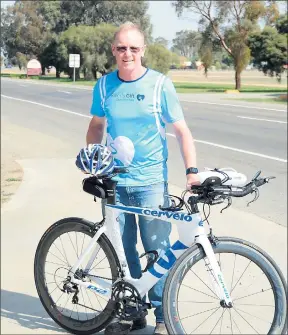  ??  ?? Special journey: Cobram’s Adrian Hayward is taking on an Ironman race — a 3.8 km swim, 42.4 km run and 180 km bike ride — to raise funds for and awareness of Sudden Infant Death Syndrome and organisati­on River’s Gift.