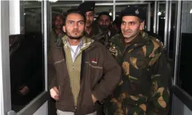  ?? Photograph: Farooq Khan/EPA ?? Saleem Rehmani being detained in 2010. His killing in 2022, previously reported as the result of a suspected armed robbery, was allegedly planned out of the UAE.