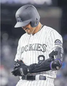  ??  ?? Josh Fuentes (8) could be a viable fill-in at either corner infield spot if the Rockies want to put Nolan Arenado or Daniel Murphy at designated hitter.