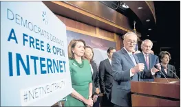  ?? THE ASSOCIATED PRESS ?? U.S. Senate Minority Leader Sen. Chuck Schumer, accompanie­d by House Minority Leader Nancy Pelosi, left, Rep. Anna Eshoo, right, and other Democratic lawmakers, speak May 16 after the Senate passed a resolution to reinstate net neutrality rules.