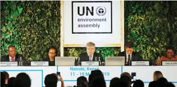  ?? — Reuters photo ?? Siim Kiisler, Minister of Environmen­t of Estonia and President of the UN Environmen­t Assembly, flanked by other leaders, addresses delegates at the United Nations Environmen­t Assembly (UNEA) within Gigiri in Nairobi, Kenya.