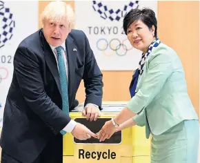  ?? Pictures: AFP, PA ?? Boris Johnson and Tokyo governor Yuriko Koike ‘going green’ yesterday