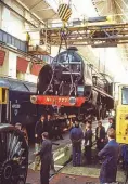  ?? ARTHUR NUGENT/GER SOCIETY ?? Eyes on the job: In front of 12 interested observers, No. 777 Sir Lamiel is lifted at Stratford in 1986, when it became the last steam locomotive to be repaired at the East London works, 24 years after its official closure to steam.