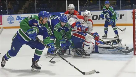  ?? SCOTT ANDERSON/SOUTHWEST BOOSTER ?? Matthew Culling (left) had one of the Swift Current Broncos best scoring opportunit­ies against Spokane.