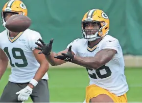  ?? MARK HOFFMAN/MILWAUKEE JOURNAL SENTINEL ?? Packers running back AJ Dillon will have to earn trust as a receiver and blocker.