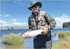  ?? PHOTO: SUPPLIED ?? Reel results . . . Mike Weddell holds a 2kg rainbow trout he caught from Blakelys Dam in the Maniototo. The rain that we have had so far this week has had little effect on rivers.