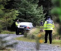  ??  ?? GRIM FIND: The area where the man’s body was found
