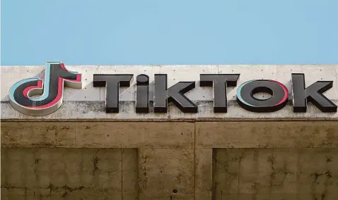  ?? Damian Dovarganes/Associated Press ?? A TikTok sign is displayed on their building in Culver City, Calif., March 11. If it feels like TikTok has been around forever, that's probably because it has, at least if you're measuring via internet time. What's now in question is whether it will be around much longer — and if so, in what form.