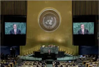  ?? LI MUZI / XINHUA ?? State Councilor and Foreign Minister Wang Yi speaks during the general debate of the 73rd session of the General Assembly at the United Nations in New York on Friday.
