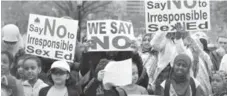  ?? TORONTO STAR ?? Parents protest the new sex-ed curriculum in May. Two Catholic school trustees say that “parts of the curriculum contradict Catholic teachings.”