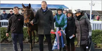  ??  ?? Wolfofalls­treets and Adam Short and Philip Rothwell after winning the ‘Naas Business Handicap Hurdle’.