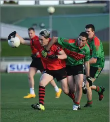  ??  ?? Jeremy King, Beale, and Paudie Clifford, Fossa, in action during Sunday’s County JFC Final replay in Austin Stack Park