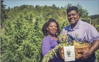  ?? PHOTOS: THE ASSOCIATED PRESS ARCHIVES ?? Clarenda Stanley-Anderson and her husband, Malcolm Anderson Sr., run a hemp-farm in North Carolina. Federal legalizati­on could triple the overall hemp market to $2.5 billion by 2022, with $1.3 billion of those sales from hemp-derived CBD products.