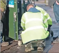  ?? a10openrea­ch02 ?? BT Openreach contractor­s at work on the fault last Wednesday.