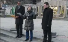  ?? GENE WALSH — DIGITAL FIRST MEDIA ?? Montgomery County commission­ers Ken Lawrence Jr., Valerie Arkoosh and Joseph Gale speak before the lighting of a tree, Menorah and Kinara at the county courthouse on Wednesday.