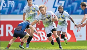  ?? Picture: GETTY IMAGES ?? STAR PLAYER: Blitzboks star Werner Kok hands off a challenge during the Paris Sevens final match against Scotland on Sunday