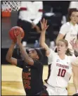  ?? Associated Press ?? BIG LOSS — USC forward Jordyn Jenkins (32) shoots as Stanford forward Alyssa Jerome (10) defends during the second half in the second round of the Pac-12 women’s tournament Thursday in Las Vegas. No. 4 Stanford won 92-53.