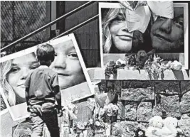  ?? JOHN ROARK/AP PHOTOS ?? A boy looks at a memorial for Tylee Ryan and JJ Vallow on June 11 in Rexburg, Idaho. The children’s remains were found June 9 at property belonging to their mother’s husband.