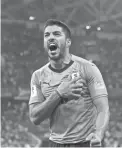  ?? AP ?? Uruguay's Luis Suarez celebrates after winning Saturday’s match against Portugal at the 2018 World Cup in Sochi, Russia.