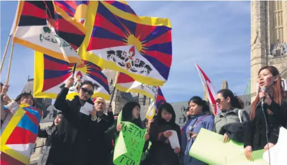  ?? Courtesy of The Canada Tibet Committee ?? Demonstrat­ors in front of the Canadian Parliament.