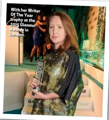  ??  ?? With her Writer Of The Year trophy at the 2015 Glamour Awards in London.