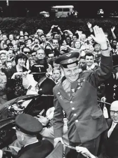  ?? (AP) ?? Yuri Gagarin waves to the crowd outside the Russian embassy in London