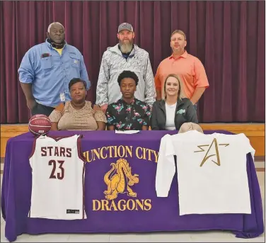  ?? Leanna Hanry/Special to the News-Times ?? Brown signs with Stars: Junction City’s Zak Brown recently signed with South Arkansas Community College. Brown averaged 14.6 points per game and 3.1 steals per game for the Dragons, who finished second in the 8-2A.