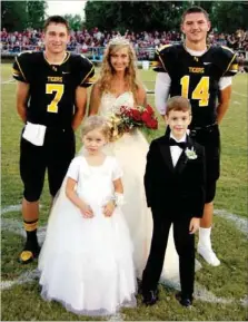  ?? BEN MADRID ENTERPRISE-LEADER ?? Prairie Grove Homecoming queen Rachel Hays presided over the festivitie­s with her escorts Nick Sugg (7) and Brandon Nodier (14) and attendants Edy Hall (left) and Alex Abshier.