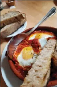  ?? PHOTO COURTESY OF JENNIFER GRAUE ?? Portland’s Tasty n Sons launched Shakshuka’s West Coast popularity when the chef put this savory brunch dish of eggs poached in a savory tomato-pepper stew on the menu.