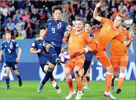  ?? LOIC VENANCE/AFP ?? Japan forward Yuika Sugasawa vies with Netherland­s forward Vivianne Miedema during their France 2019 women’s World Cup round of sixteen match on June 25 at the Roazhon Park stadium in Rennes, north western France.