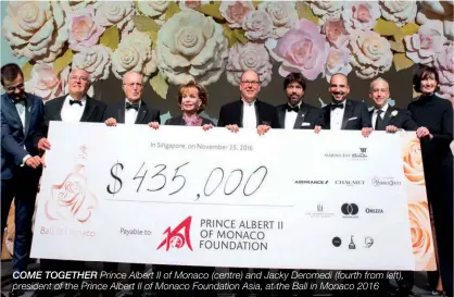  ??  ?? COME TOGETHER Prince Albert II of Monaco (centre) and Jacky Deromedi (fourth from left), president of the Prince Albert II of Monaco Foundation Asia, at the Ball in Monaco 2016