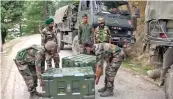  ?? ?? Army personnel carry weapons and equipment near encounter site in Doda on Wednesday