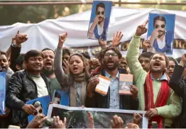  ?? — PRITAM BANDYOPADH­YAY ?? Former JNU Students’ Union president Kanhaiya Kumar ( from left), former vice- president Shehla Rashid Shora, Gujarat MLA Jignesh Mevani and farmers’ leader Akhil Gogoi hold posters of Bhim Army’s founder Chandra Shekhar Azad at Yuva Hunkar rally in...