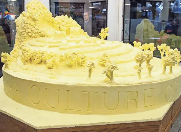  ?? DAN GLEITER,/AP ?? The butter sculpture unveiled at the 101st Pennsylvan­ia Farm Show, made from more than 1,000 pounds of butter, pays tribute to the history of environmen­tal stewardshi­p by dairy farmers.