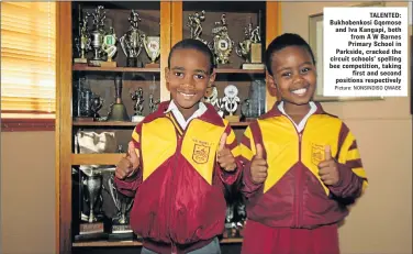  ?? Picture: NONSINDISO QWABE ?? TALENTED: Bukhobenko­si Gqomose and Iva Kangapi, both from A W Barnes Primary School in Parkside, cracked the circuit schools’ spelling bee competitio­n, taking first and second positions respective­ly