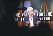  ?? Scott Strazzante / The Chronicle ?? Apple CEO Tim Cook speaks at the Fortune CEO Initiative conference Monday in San Francisco.