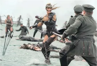  ?? WARNER BROS. PHOTOS: ?? Robin Wright says she suffered some serious injuries while training for her role as Wonder Woman’s aunt, General Antiope.